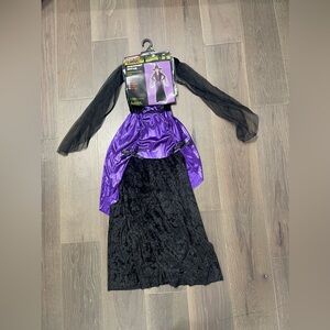 Totally ghoul midnight witch child costume. NWT size large includes hat/dress